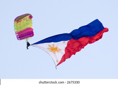 Philippine Flag Attached To A Skydiver During The International Hot Air Fiesta In Clark Airfield, Pampanga