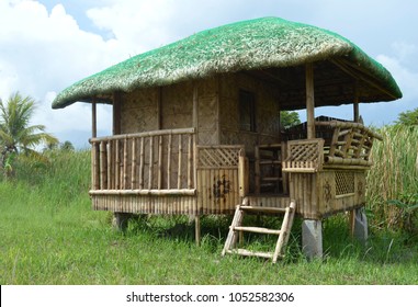 bahay kubo images stock photos vectors shutterstock https www shutterstock com image photo philippines bahay kubo native house middle 1052582306