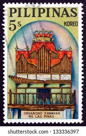 PHILIPPINES - CIRCA 1964: a stamp printed in Philippines shows Bamboo organ in the Church of Las Pinas, Rizal, was built by Father Diego Cera, circa 1964