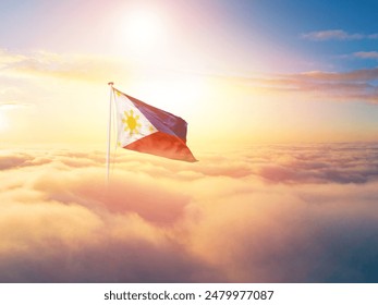 Philippines national flag aerial view clouds in beautiful sky. Top view. Drone. Aerial bird's eye fly flag. Aerial top flag view cloudscape. Flag with Sunrise or sunset over clouds. - Powered by Shutterstock