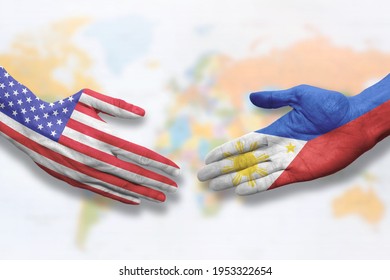 Philippines and USA - Flag handshake symbolizing partnership and cooperation with the United States of America - Powered by Shutterstock