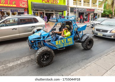 Philipsburg, St. Maarten - May 1, 2019: Unidentified Man In A Dune Buggy On The Streets Of The Philipsburg City, St. Maarten, Dutch Caribbean.