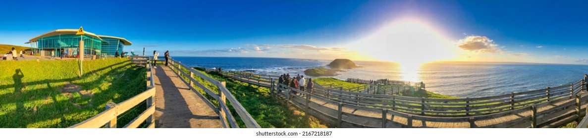 Phillip Island, Australia - September 7, 2018: The Nobbles viewpoint at sunset with tourists, panoramic aerial view.