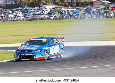 PHILLIP ISLAND, MELBOURNE/AUSTRALIA - 17 APRIL 2016: Nick Percat's Holden Commodore Suffers Mechanical Damage As It Exits Turn 4 At Phillip Island.