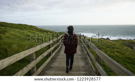 Similar – Foto Bild Cliffs of Moher, Frau schaut in die Ferne