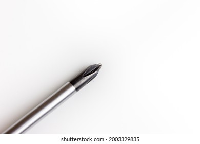 A Phillips Screwdriver On A White Background. Place The Text Next To The Screwdriver. Screwdriver Rod Close-up. An Isolated Object.