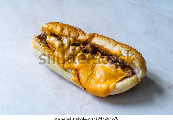 Philly Cheese Steak Sandwich with Melted Cheddar
Cheese. Ready to Eat Fast
Food.