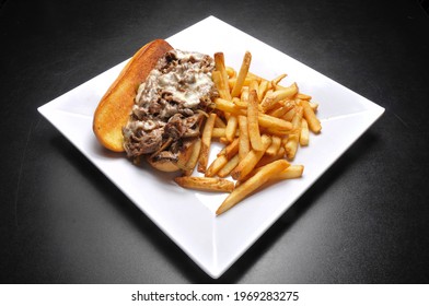 Philly Cheesesteak and an order of French Fries
