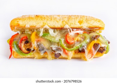 Philly Cheesesteak Sandwich With Roasted Beef, Pepper, Caramelized Onion, Mushrooms And Melted Cheese On A White Background