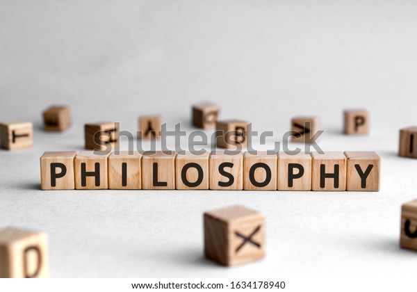 Philosophy - words from wooden blocks with letters, love of wisdom philosophy concept, white background