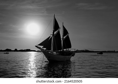 A Phinisi Boat And The Sunset