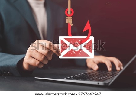 Phishing attack concept with man targeted by scam email on laptop, representing spoofing, fraudulent messages, cybersecurity risk, and online fraud awareness.
