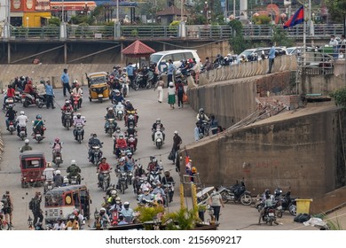 PHNOM PENH, CAMBODIA - Apr 11, 2022: The Rush Hour At A Ferry Pier In The Evening With Many People In Phnom Penh, Cambodia