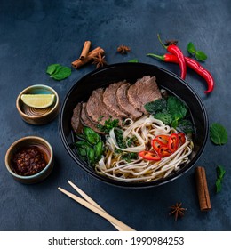 pho bo soup with beef, Pho bo Vietnamese food, rice noodle soup with sliced beef. Vietnamese fresh rice noodle soup with beef. Vietnam's national dish