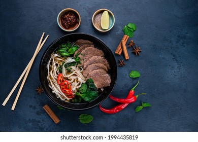 pho bo soup with beef, Pho bo Vietnamese food, rice noodle soup with sliced beef. Vietnamese fresh rice noodle soup with beef. Vietnam's national dish top view, flat lay