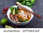 Pho Bo - Vietnamese fresh rice noodle soup with beef, herbs and chili. Vietnam