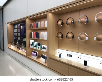 PHOENIX - APRIL 19: Beats by Dre headphones, Air-pods, and other accessories displayed for sale at the renovated Apple Store at Arrowhead shopping mall in Phoenix, Arizona USA on April 19, 2017.