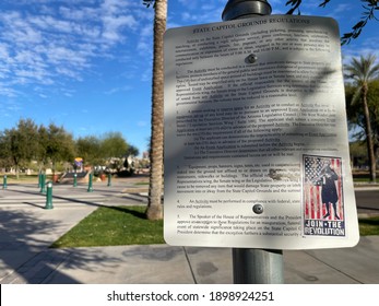 Phoenix, Ariz., USA - January 20, 2021: Trump Supporters Upset About Election Results Leave Stickers Showing Guns And Promising Revolution On Signs Around The Capitol. 1978