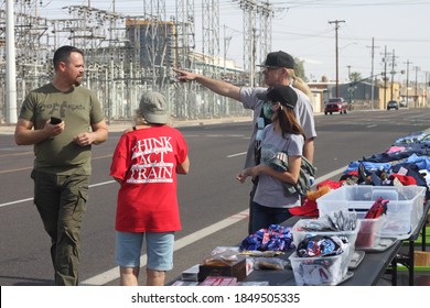 Phoenix, Ariz. / USA - November 7, 2020: Trump Supporters Gathering To Protest The 2020 Election Browse Campaign Merchandise Across The Street From The Maricopa County Recorder. 2234