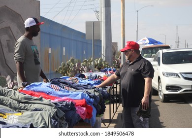 Phoenix, Ariz. / USA - November 7, 2020: Trump Supporters Gathering To Protest The 2020 Election Browse Campaign Merchandise Across The Street From The Maricopa County Recorder. 2189