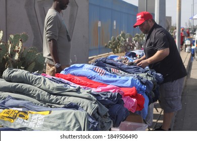 Phoenix, Ariz. / USA - November 7, 2020: Trump Supporters Gathering To Protest The 2020 Election Browse Campaign Merchandise Across The Street From The Maricopa County Recorder. 2186