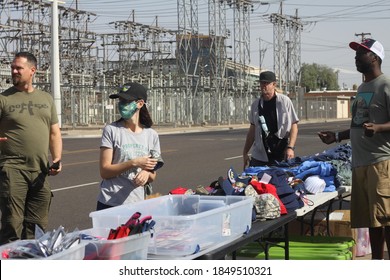 Phoenix, Ariz. / USA - November 7, 2020: Trump Supporters Gathering To Protest The 2020 Election Browse Campaign Merchandise Across The Street From The Maricopa County Recorder. 2232