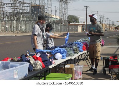 Phoenix, Ariz. / USA - November 7, 2020: Trump Supporters Gathering To Protest The 2020 Election Browse Campaign Merchandise Across The Street From The Maricopa County Recorder. 2230