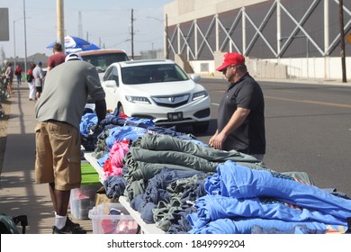 Phoenix, Ariz. / USA - November 7, 2020: Trump Supporters Gathering To Protest The 2020 Election Browse Campaign Merchandise Across The Street From The Maricopa County Recorder. 2190