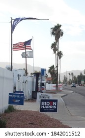 Phoenix, Ariz. / USA - October 26, 2020: Flags Fly Above Election Signs For Candidates, Including Mark Kelly For Arizona Senate And For President, Joe Biden With Running Mate Kamala Harris. 1438