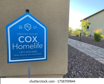 Phoenix, Arizona, June 18, 2020: Cox Homelife Security System Sign In The Front Yard Of A House