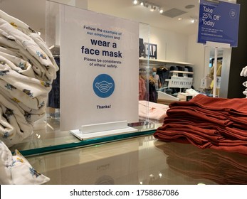 Phoenix, Arizona, June 18, 2020: Face Mask Sign In A Gap Retail Store During The Reopening Of Stores During The Covid 19 Pandemic