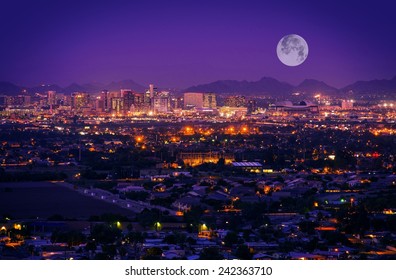 Phoenix Arizona Skyline at Night. Full Moon Over Phoenix, Arizona, United States.