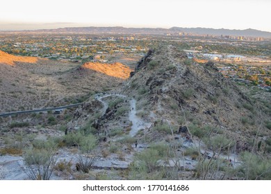 Phoenix, Arizona / USA - July 4, 2020: People Hike The Trails At The Phoenix Mountains Preserve At Sunset.