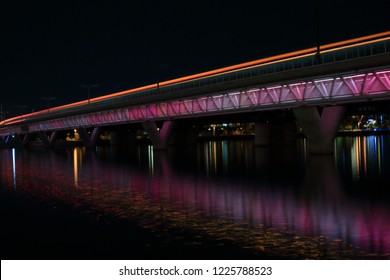 A Phoenix Arizona Valley Metro Light Rail Commuter Train Passing Over Teh Tempe Town Lake As It Is Headed Toward Tempe Arizona From Phoenix Arizona