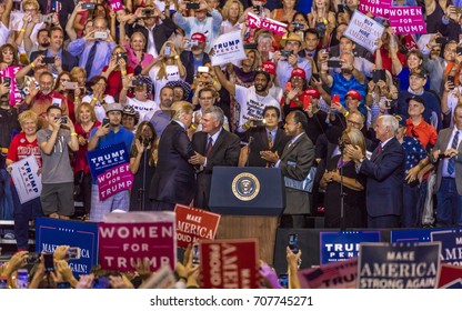 PHOENIX, AZ - AUGUST 22, 2017: President Donald Trump Shakes Hands With Franklin Graham At President Trump Rally In Phoenix, Arizona