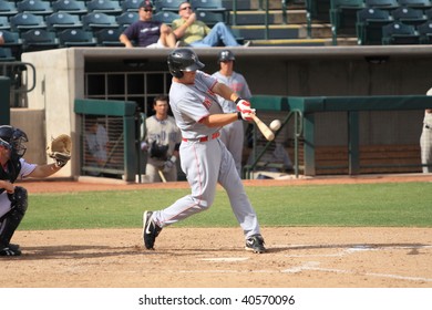 PHOENIX, AZ - NOVEMBER 4: Cincinnati Reds Prospect Chris Heisey Connects In An Arizona Fall League Game Nov. 4, 2009 In Phoenix, Arizona. Heisey's Homer Helped The Saguaros Beat The Desert Dogs, 3-2.