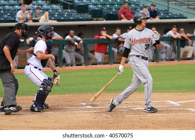 PHOENIX, AZ - NOVEMBER 4: Jason Castro, a Houston Astros prospect, bats for the Peoria Saguaros in the Arizona Fall League Nov. 4, 2009 in Phoenix, Arizona. Catcher Sean Rooney (Nationals) looks on.