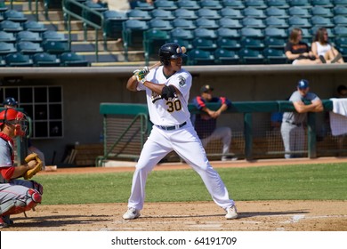 PHOENIX, AZ - OCTOBER 19: Michael Taylor, A Top Prospect For The Oakland A's, Plays For The Phoenix Desert Dogs In An Arizona Fall League Game Oct. 19, 2010 At Phoenix Municipal Stadium.