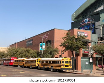 PHOENIX, AZ, USA - DECEMBER 14, 2017:  Charter And School Buses Closely Parked For A Special Event At Chase Field In Phoenix Downtown, Arizona