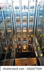 PHOENIX, AZ / USA - JANUARY 8 2011:  Vertical Circulation Core And Three Glass Elevator Shafts Inside The Burton Barr Central Library In Downtown Phoenix, Carries Visitors To Each Of The Five Floors.