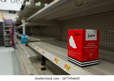 Phoenix, AZ / USA March 16th, 2020: An Empty Aisle For Feminine Hygiene Products, Days After The National Emergency For Covid-19 Was Announced.  