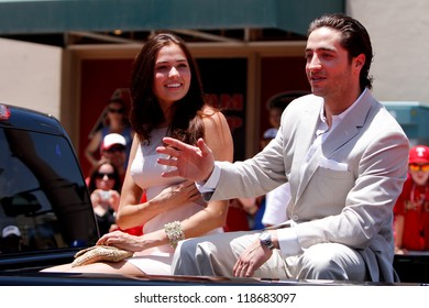 PHOENIX, AZ-JULY 12: Milwaukee Brewers Outfielder Ryan Braun Rides With Girlfriend Larisa Fraser At The 2011 MLB Chevy All-Star Red Carpet Parade On July 12, 2011 In Phoenix, Arizona.