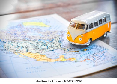 Phoenix, USA, 1 Apr 2018 - An Hippie Van Model On A North America Map USA On The Road Trip Globetrotter Traveler