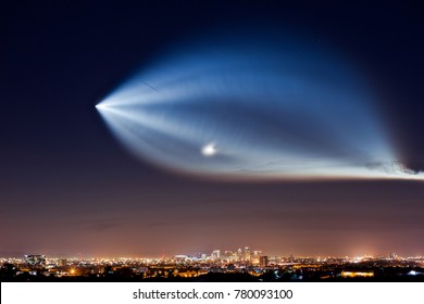 Phoenix, USA - 22nd Dec, 2017. The SpaceX Falcon 9 Rocket, Launched From Vandenberg Air Force Base On Friday Evening As Seen Over Downtown Phoenix. The Rocket Was Carrying 10 Iridium  Satellites.