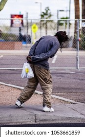 Phoenix, USA - March 15, 2018: A Mentally Ill Homeless Man Sways From Side To Side On The Sidewalk.