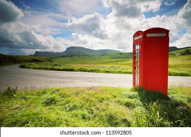 Phone Booth In The Middle Of A Green Field