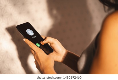 Phone Call From A Anonymous Stalker. Stalking Or Bullying With Phone Concept. Stalker Caller, Scammer Or Stranger. Woman Answering To Incoming Call. Ex Boyfriend With Fake Identity.