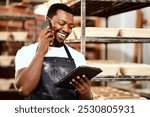 Phone call, baker and laughing black man on tablet for online order, talking or cooking. Communication, smile or chef in bakery on technology for food production, bread manufacturing or startup sales