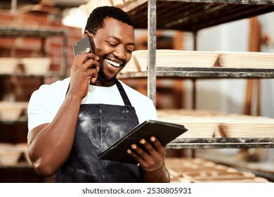 Phone call, baker and laughing black man on tablet for online order, talking or cooking. Communication, smile or chef in bakery on technology for food production, bread manufacturing or startup sales - Powered by Shutterstock