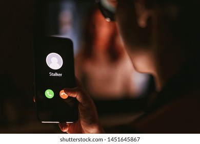 Phone Call From A Stalker Late At Night. Stalking Or Bullying With Smartphone Concept. Stalker Caller, Scammer Or Stranger. Woman Answering To Incoming Call. Ex Boyfriend With Fake Identity.